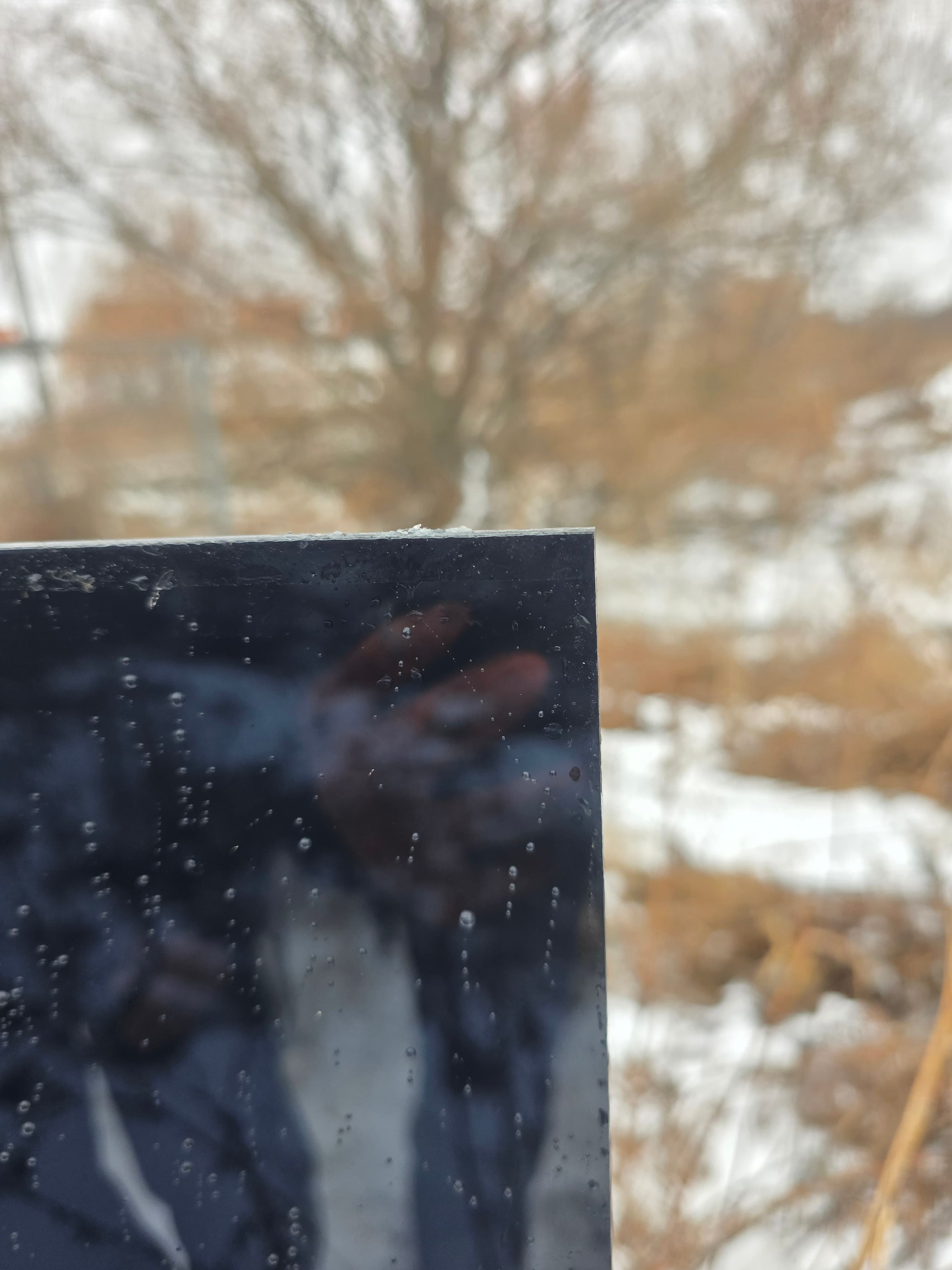 Smoky gray polycarbonate sheet showing tint and outdoor durability