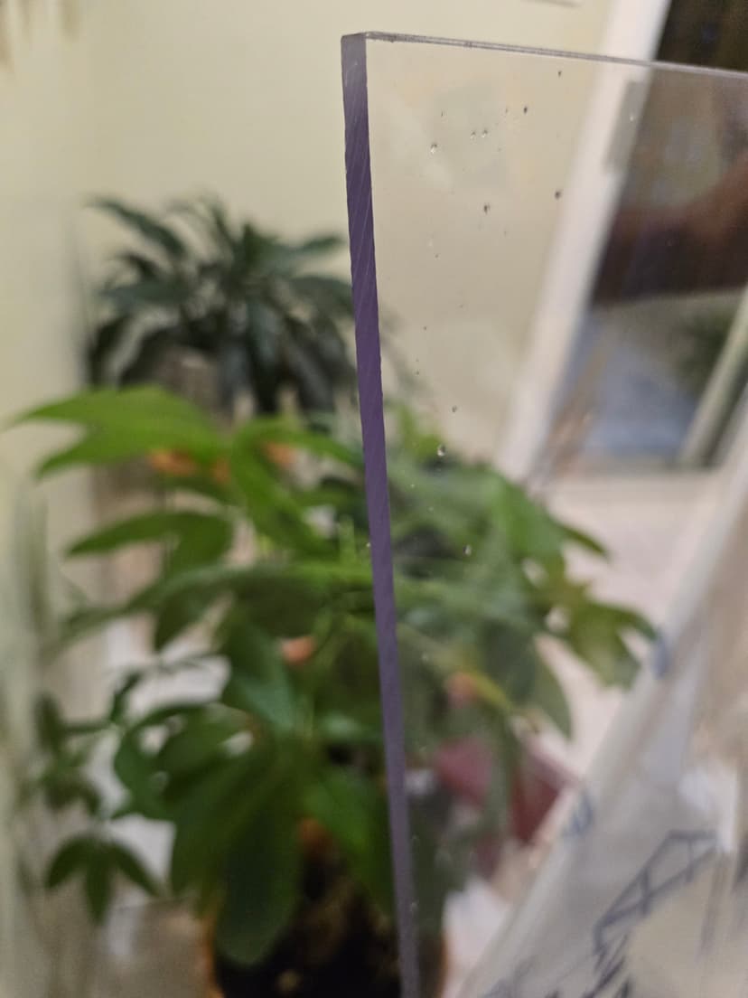 Clear polycarbonate sheet edge showing thickness and clarity